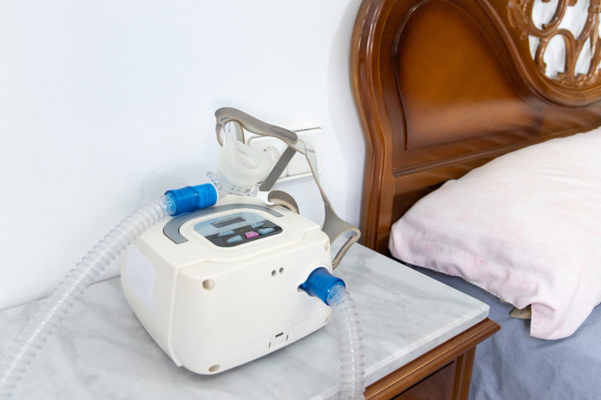 CPAP machine on a nightstand